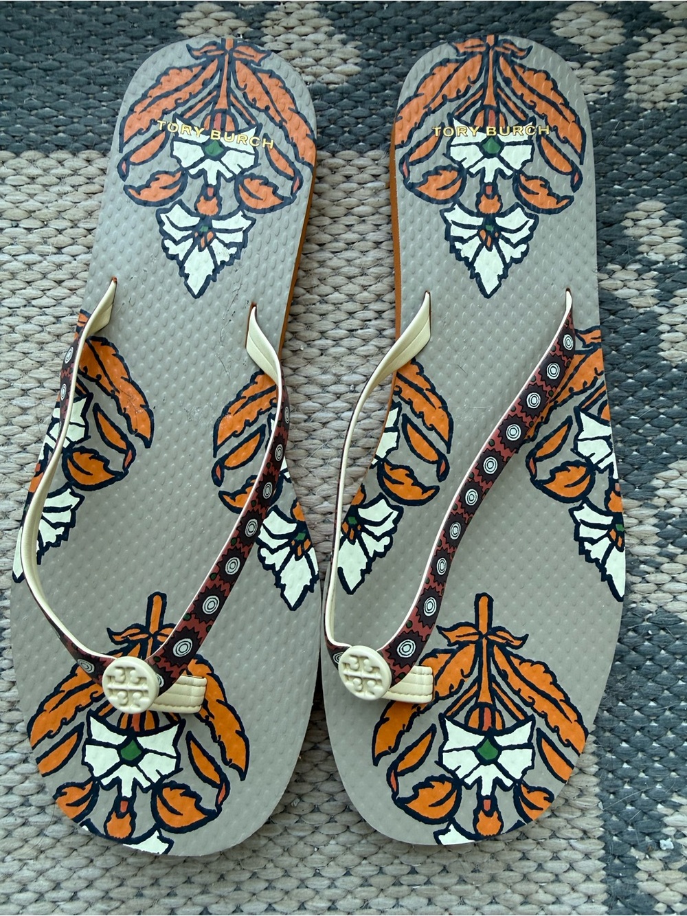 Tory Burch Women's Beige Flip Flops with Orange Floral Print and Leather Straps